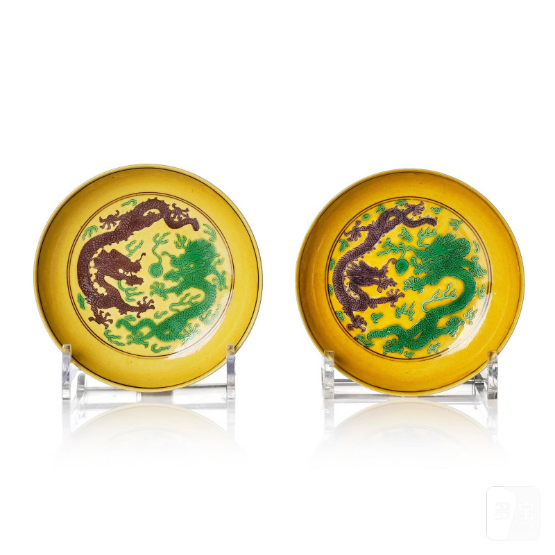 A pair of yellow ground aubergine- and green-enamelled 'dragon' dishes,